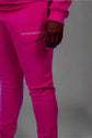 Taller Than LIfe Collection ENDLESS HEIGHTS tracksuit set in vibrant pink featuring matching hoodie and pants.